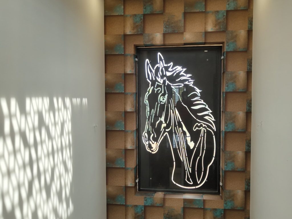 3D textured wallpaper with brown and teal checkered pattern